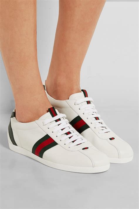 givenchy or gucci sneakers.